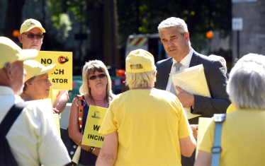 Steve Barclay protesting